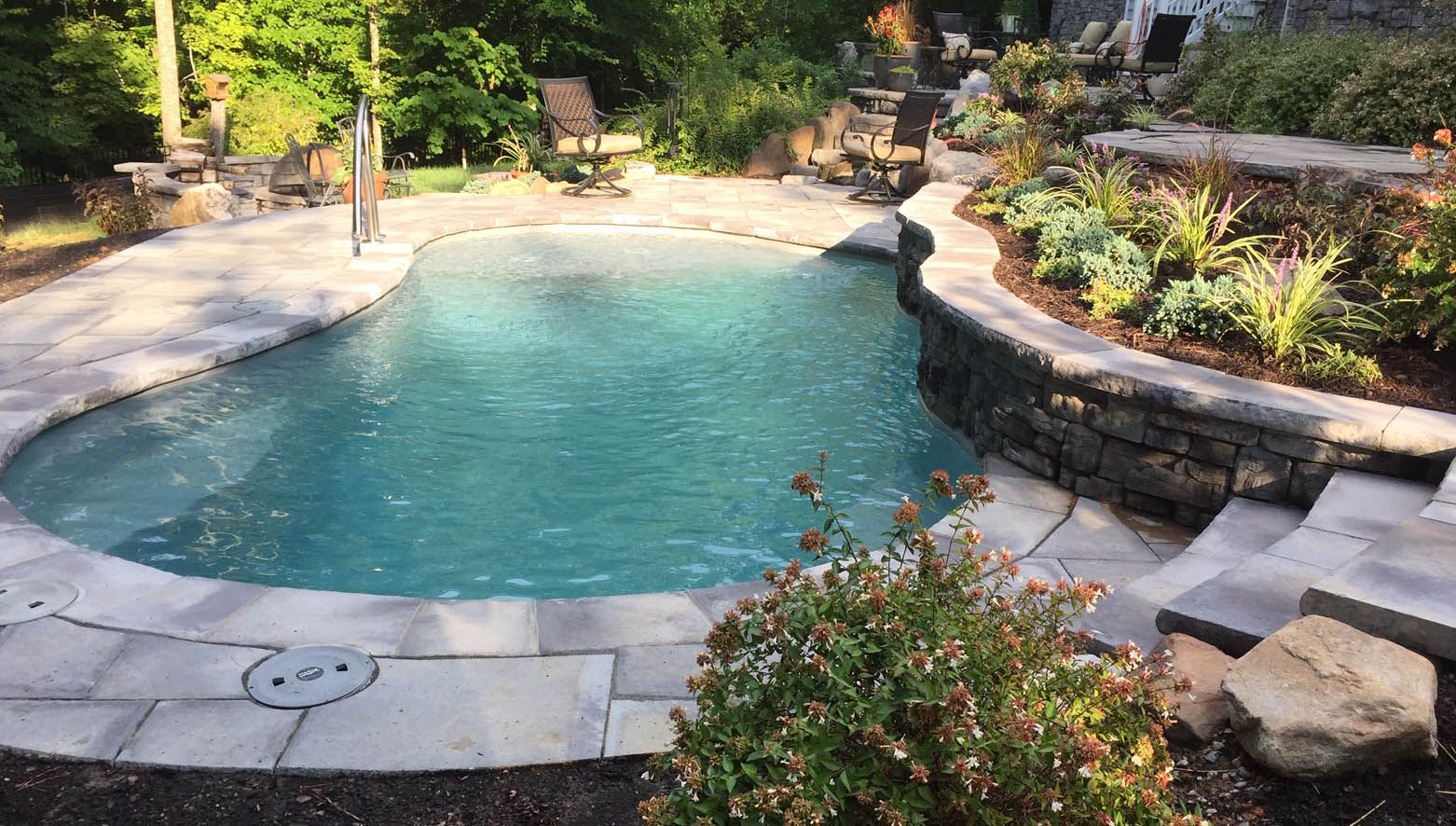 fiberglass pool with landscaping