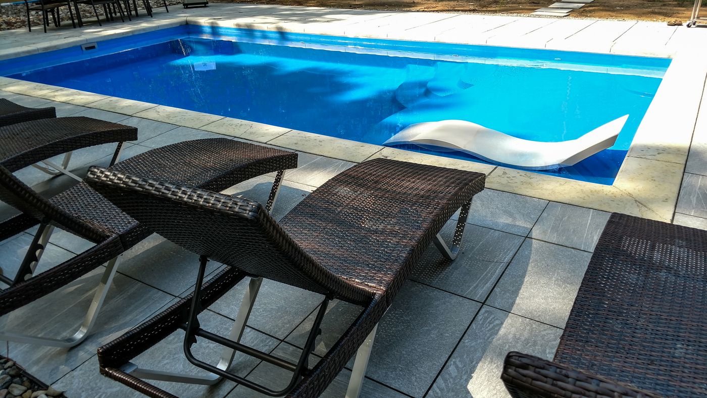 fiberglass pool with patio