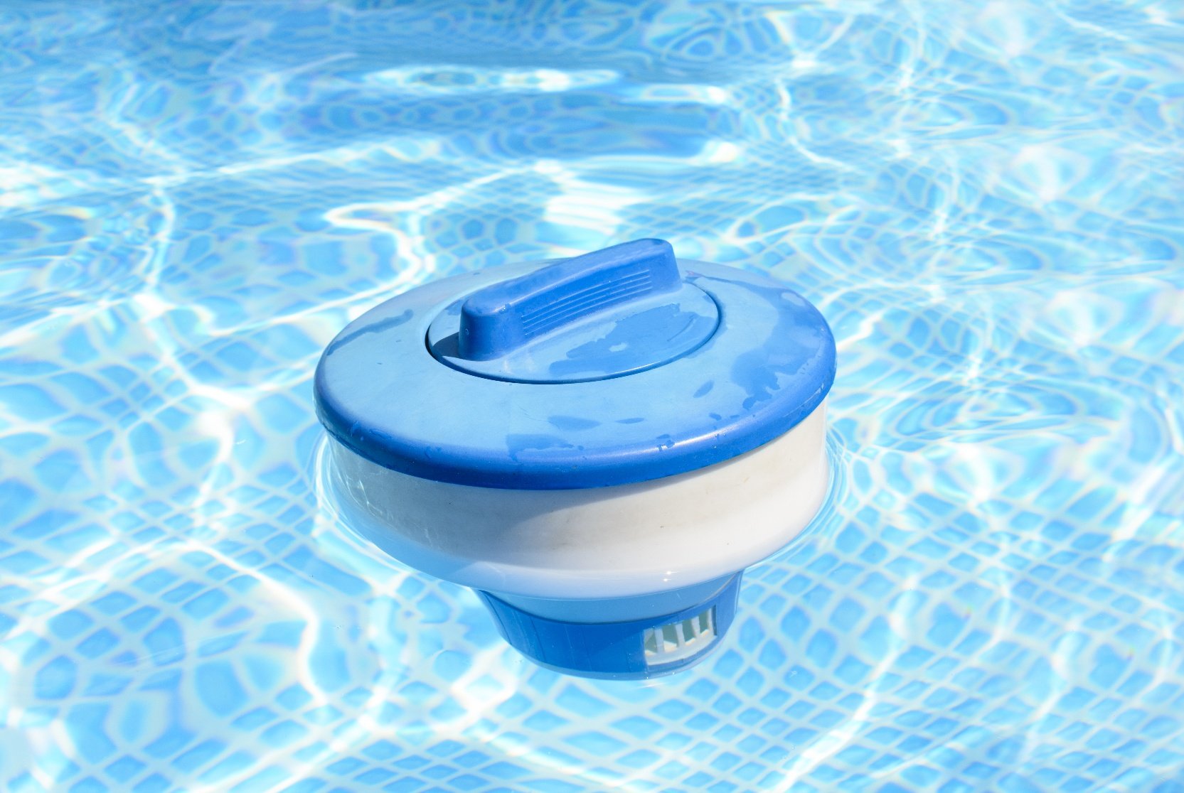 a floating chlorine pool dispenser