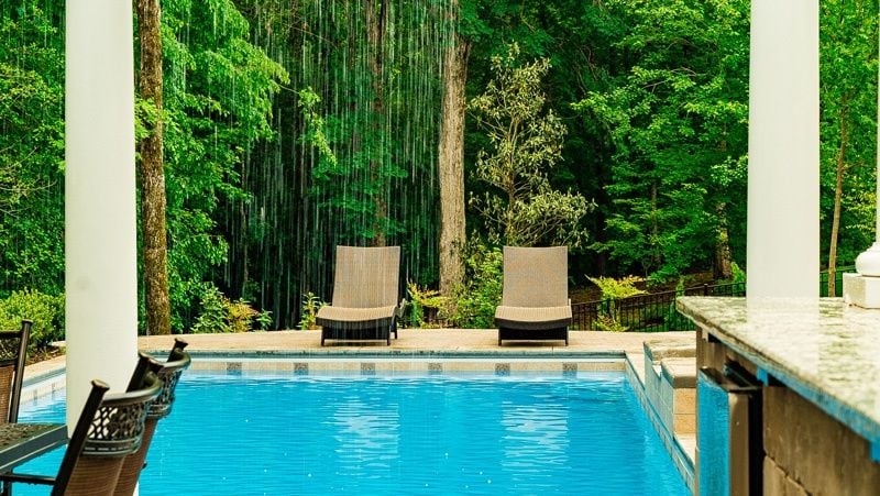 fiberglass swimming pool with water feature
