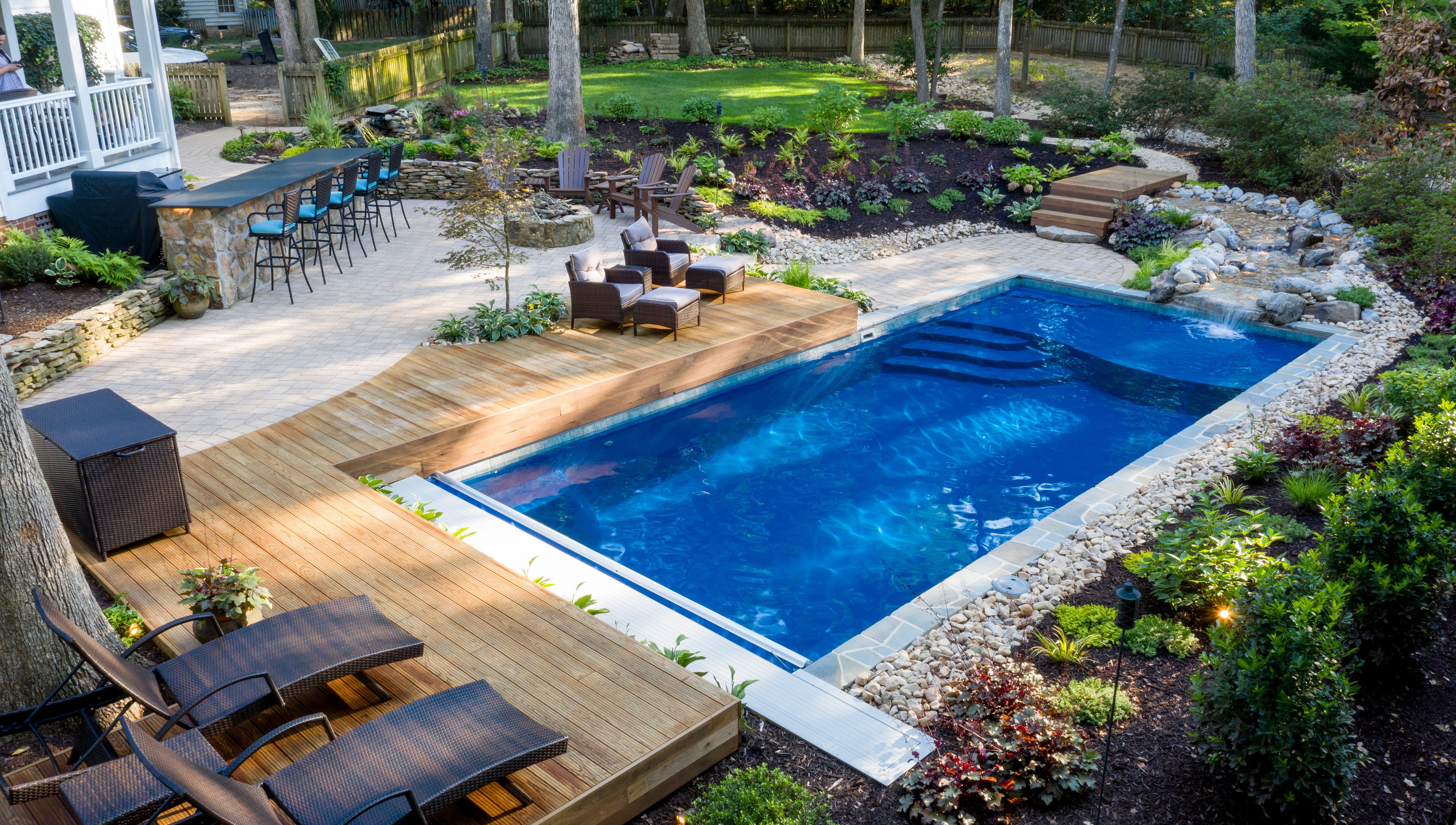 fiberglass inground swimming pool with landscape